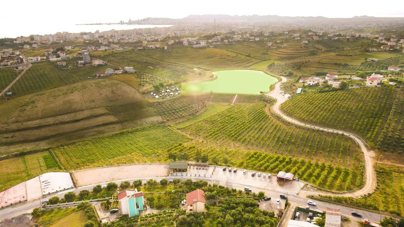 The farm, the lake and the orchards from above